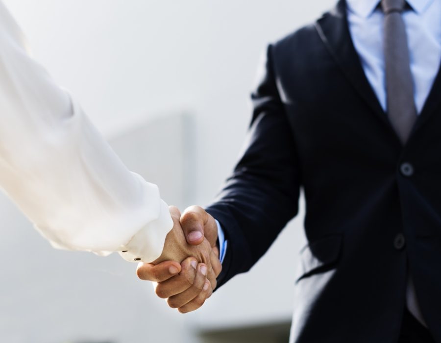 Business people shaking hands for an agreement